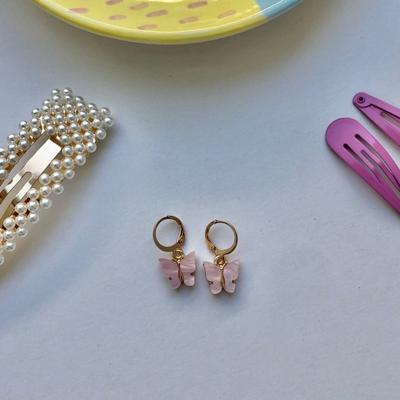 Urban Outfitters Accessories - Light pink butterfly earrings